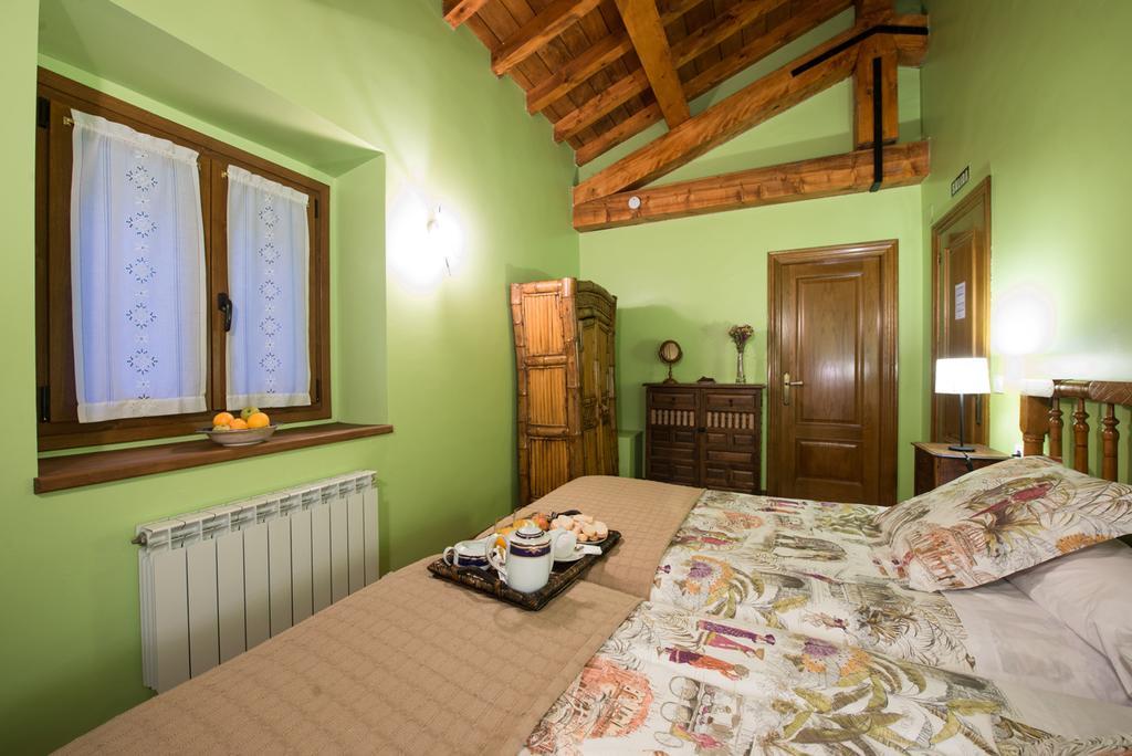 Penzion Ekolanda Esnoz Pokoj fotografie